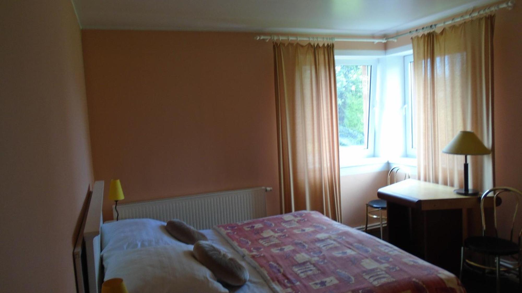 Hotel Getliin Saku Quarto foto